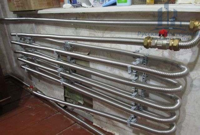 Установка системы отопления из черных труб от строительной компании Русский Мастеровой